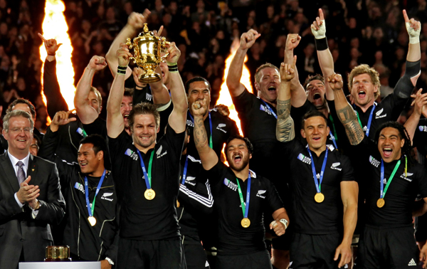 a group of players holding up their trophy
