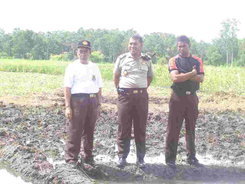 three men standing by the side of the river