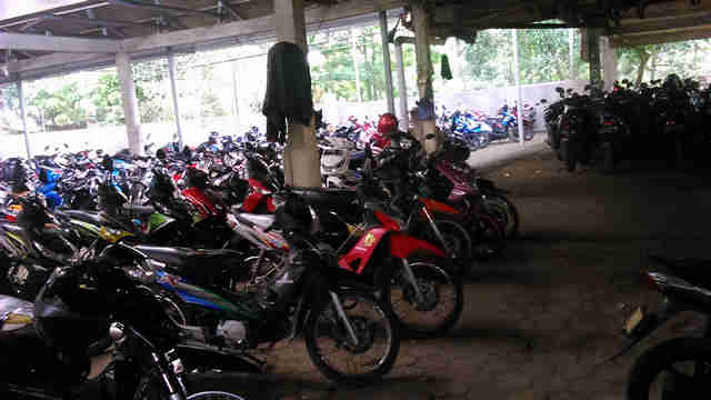 a number of motorcycles parked near one another