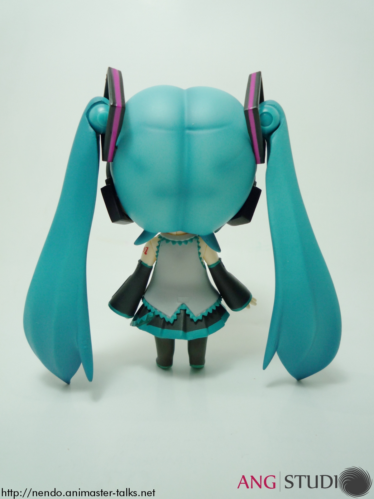 there is a dolls head with blue hair