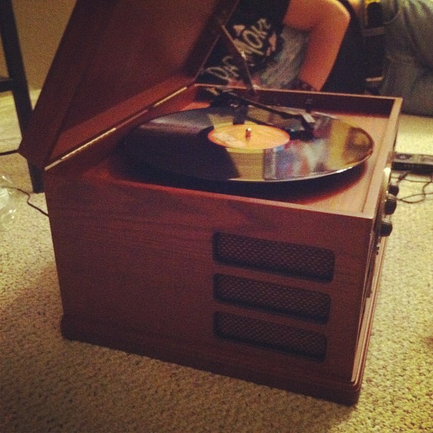 a record player is open and it's on display