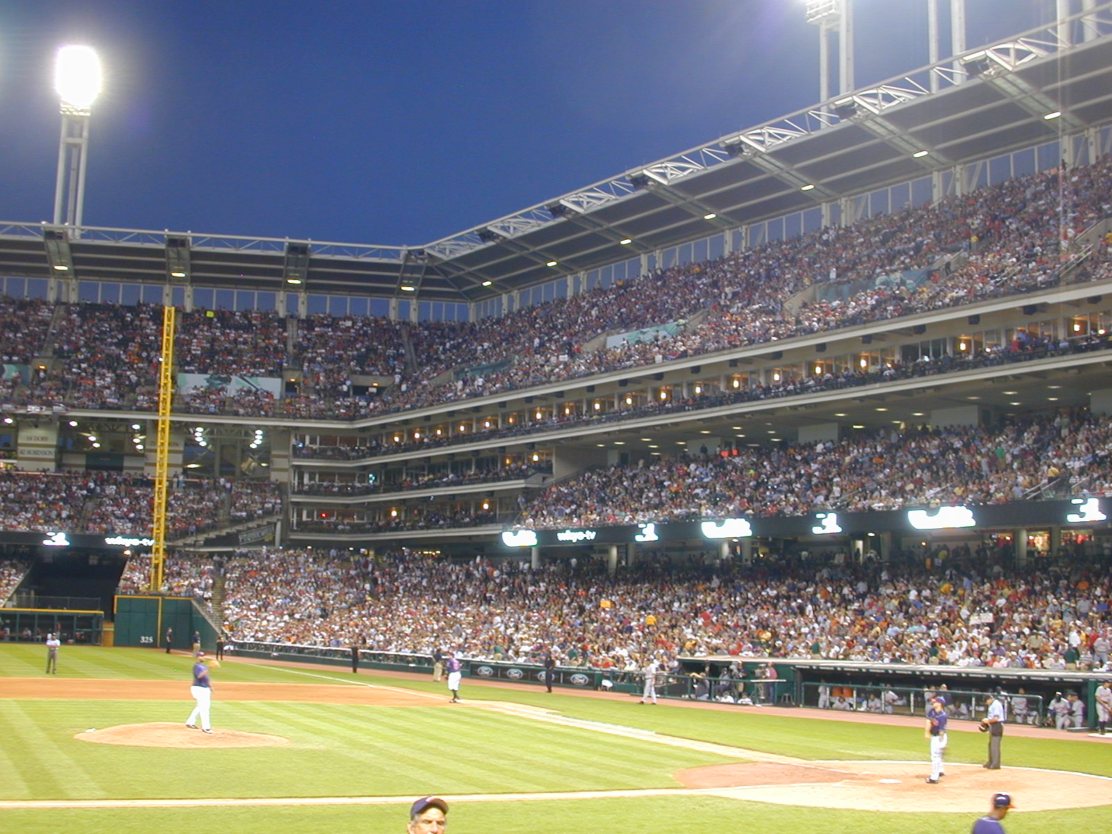 a baseball stadium with an array of spectators