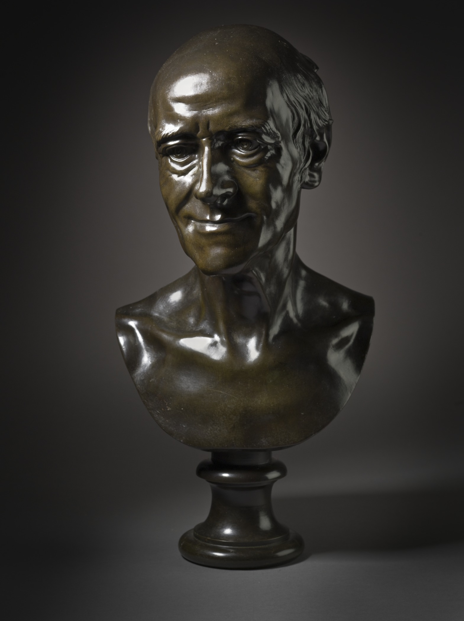 a bust - shaped bronze sculpture of president bill clinton