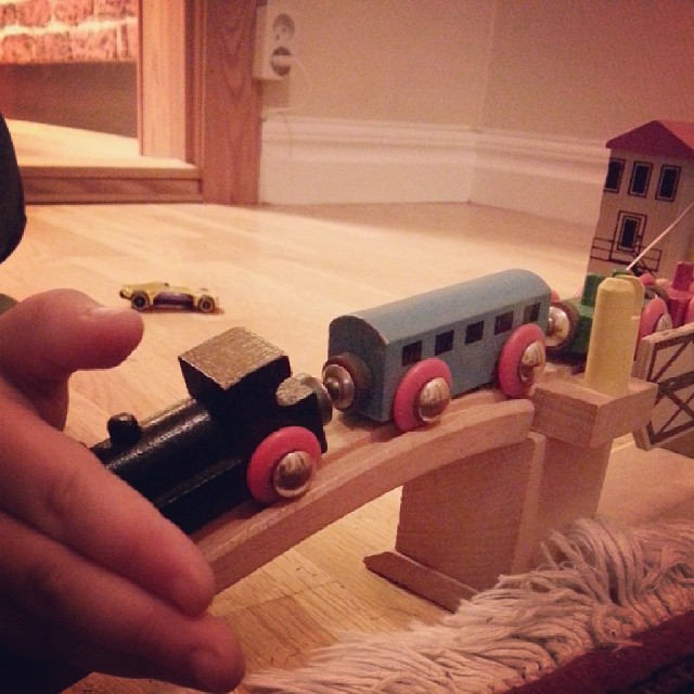 this person is playing with his toy train