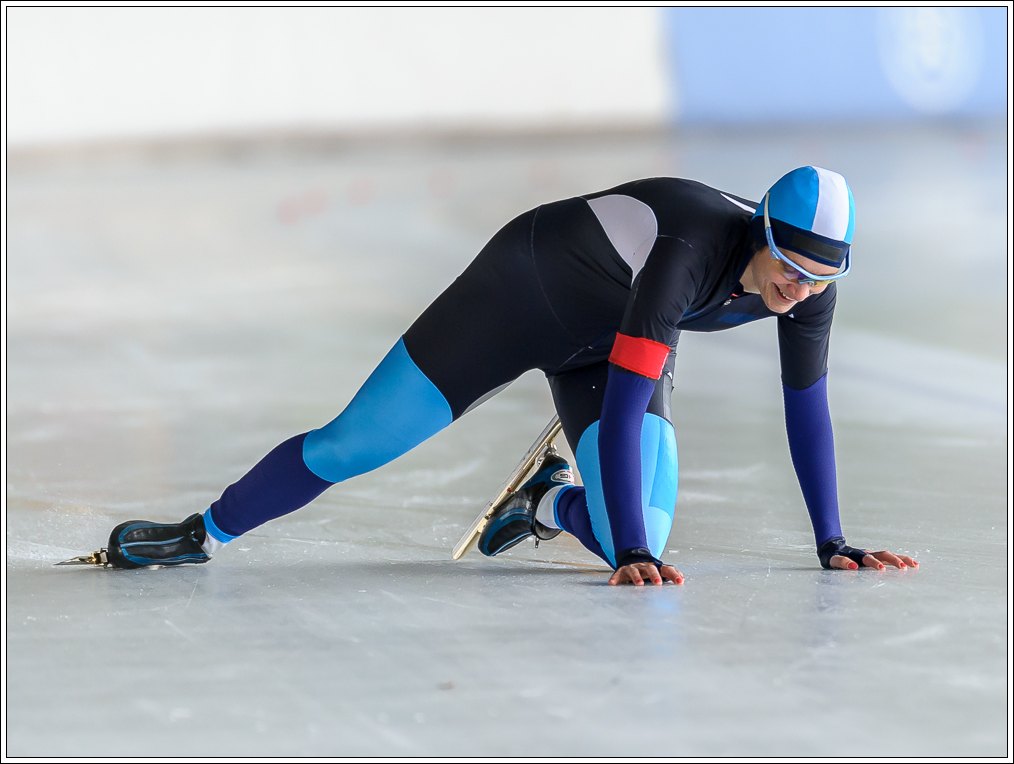 an athlete on the ice on a cold day