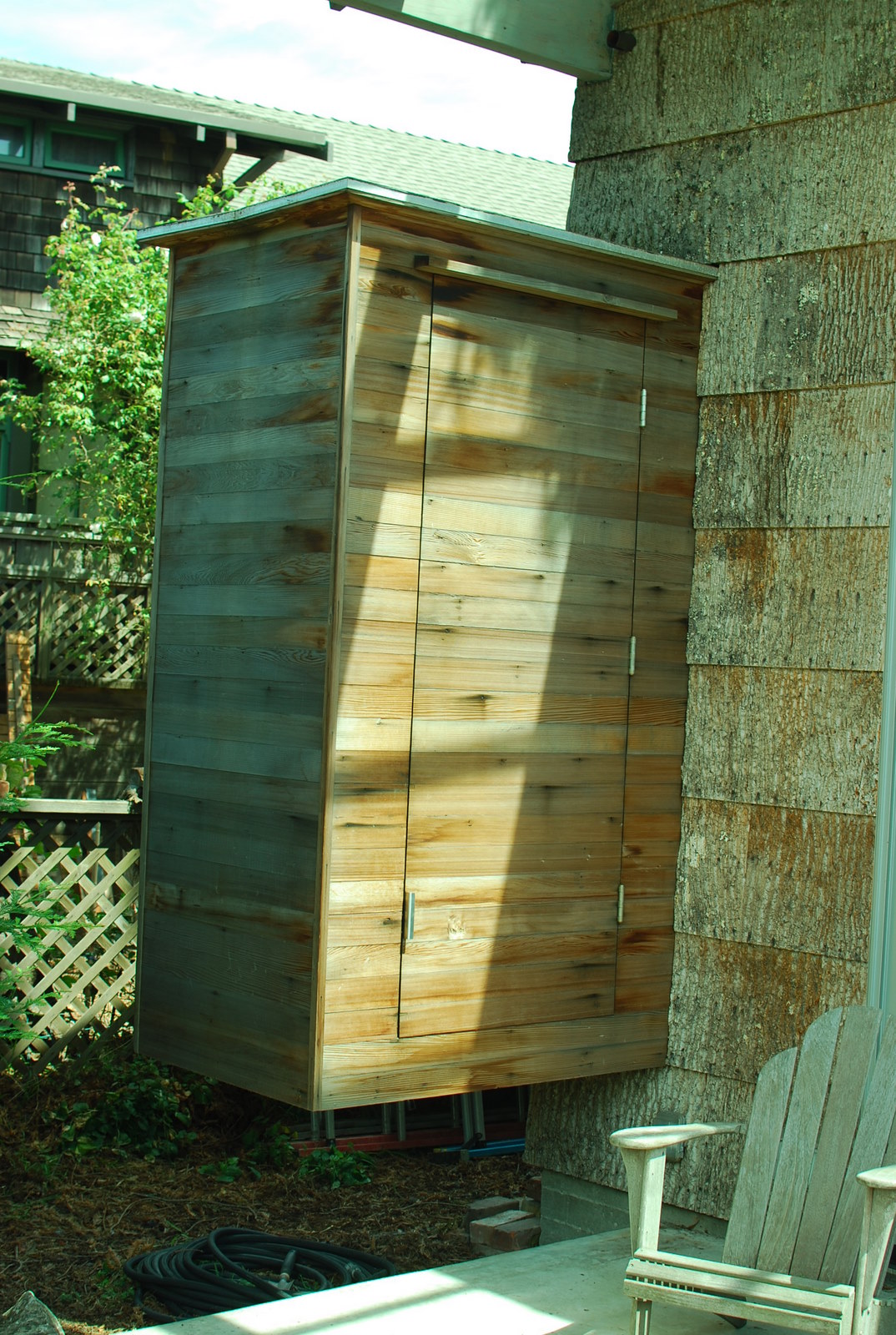 the outside area of a house with a shed