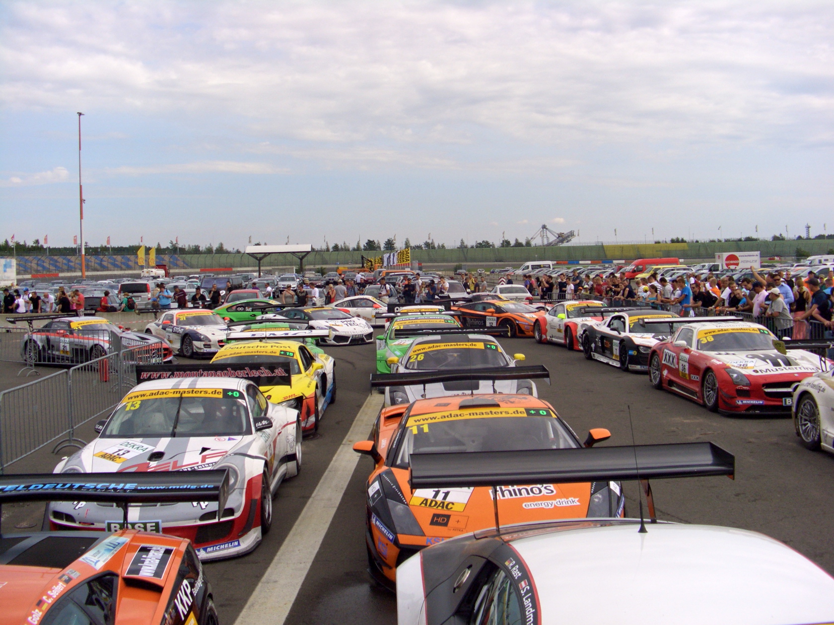 there are many cars that are all on this race field
