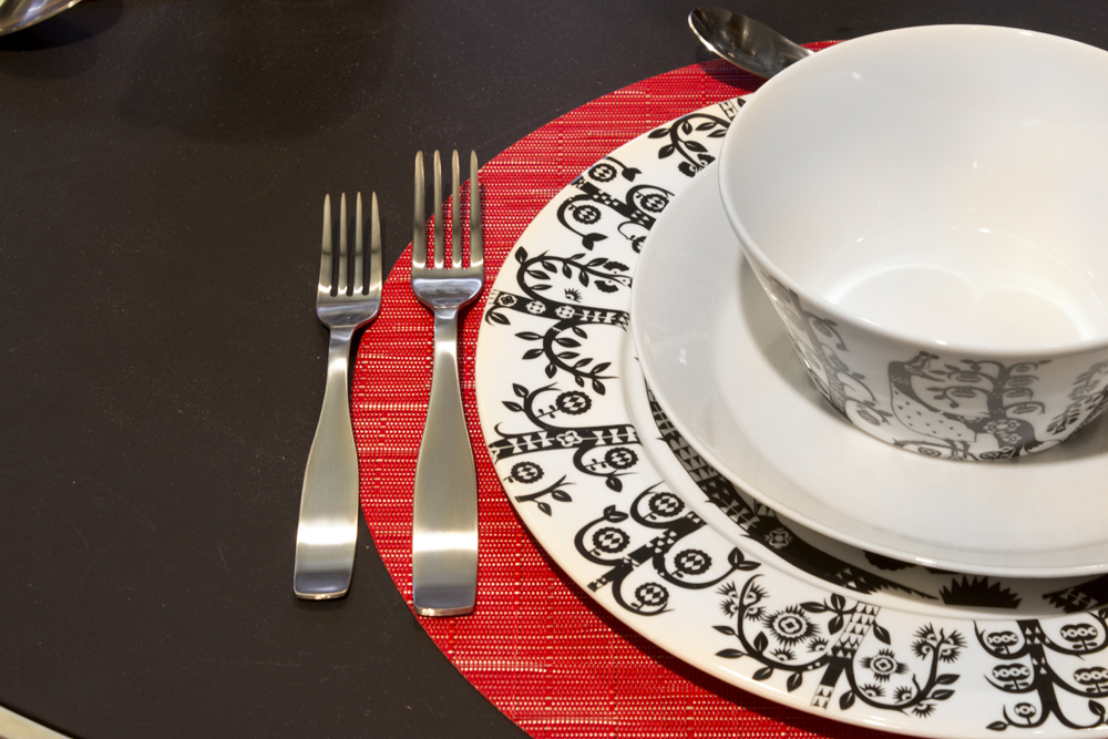 a table setting consisting of a bowl and a plate