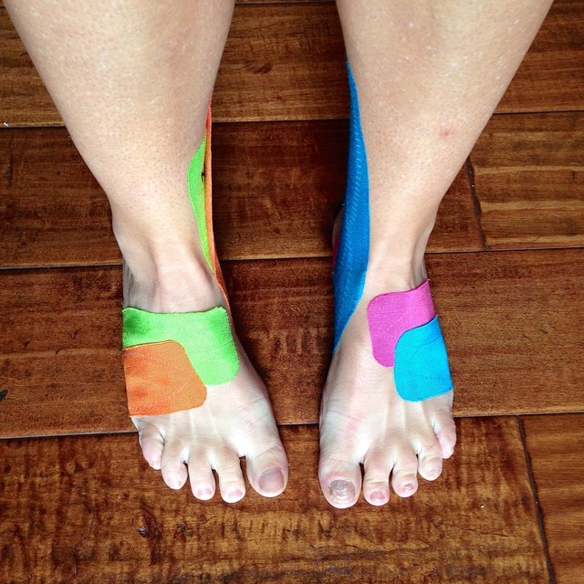 feet in sandals that are colored to show different colors
