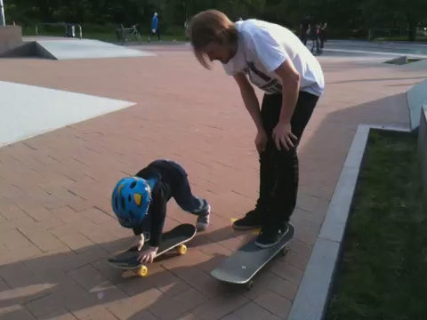 a person that is standing on a skateboard