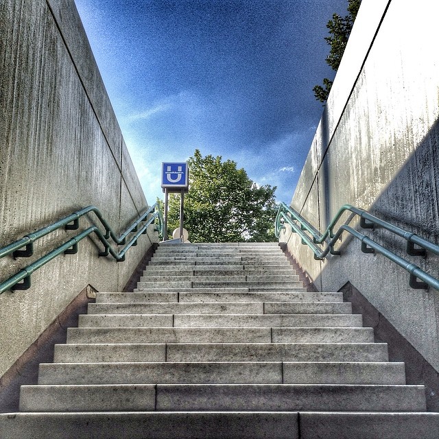 stairs to the top of two buildings with no entry signs