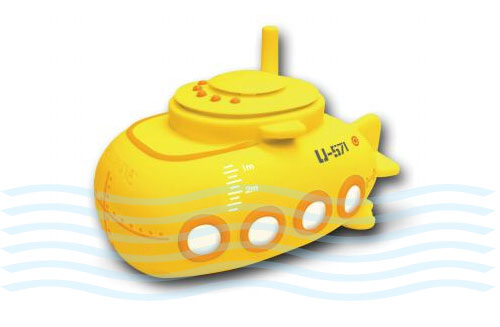 the yellow toy submarine boat is floating in the water
