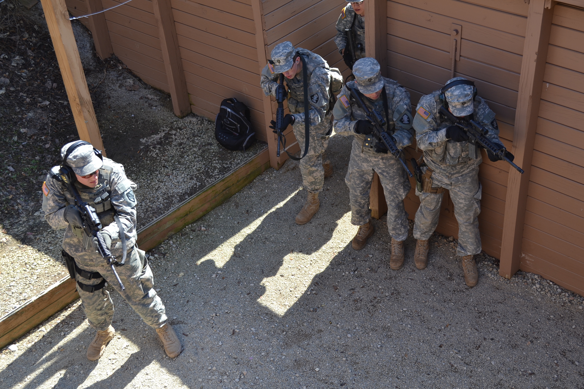 several soldiers are lined up against the wall