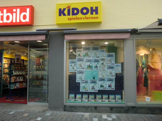 a shop front with an advertit on it for children's books