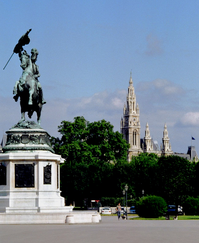 there is a statue with a bird on top