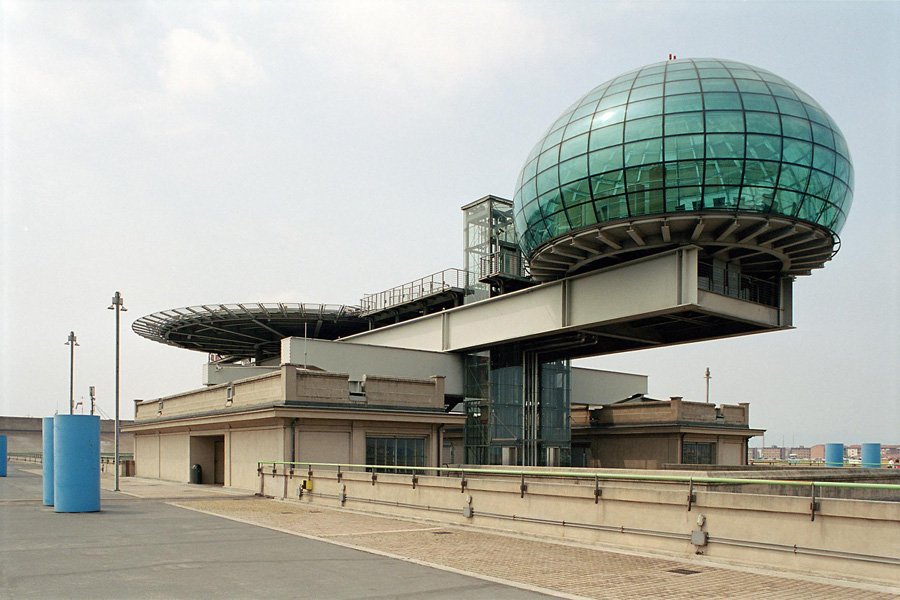 a building with an outdoor sky tunnel on top of it