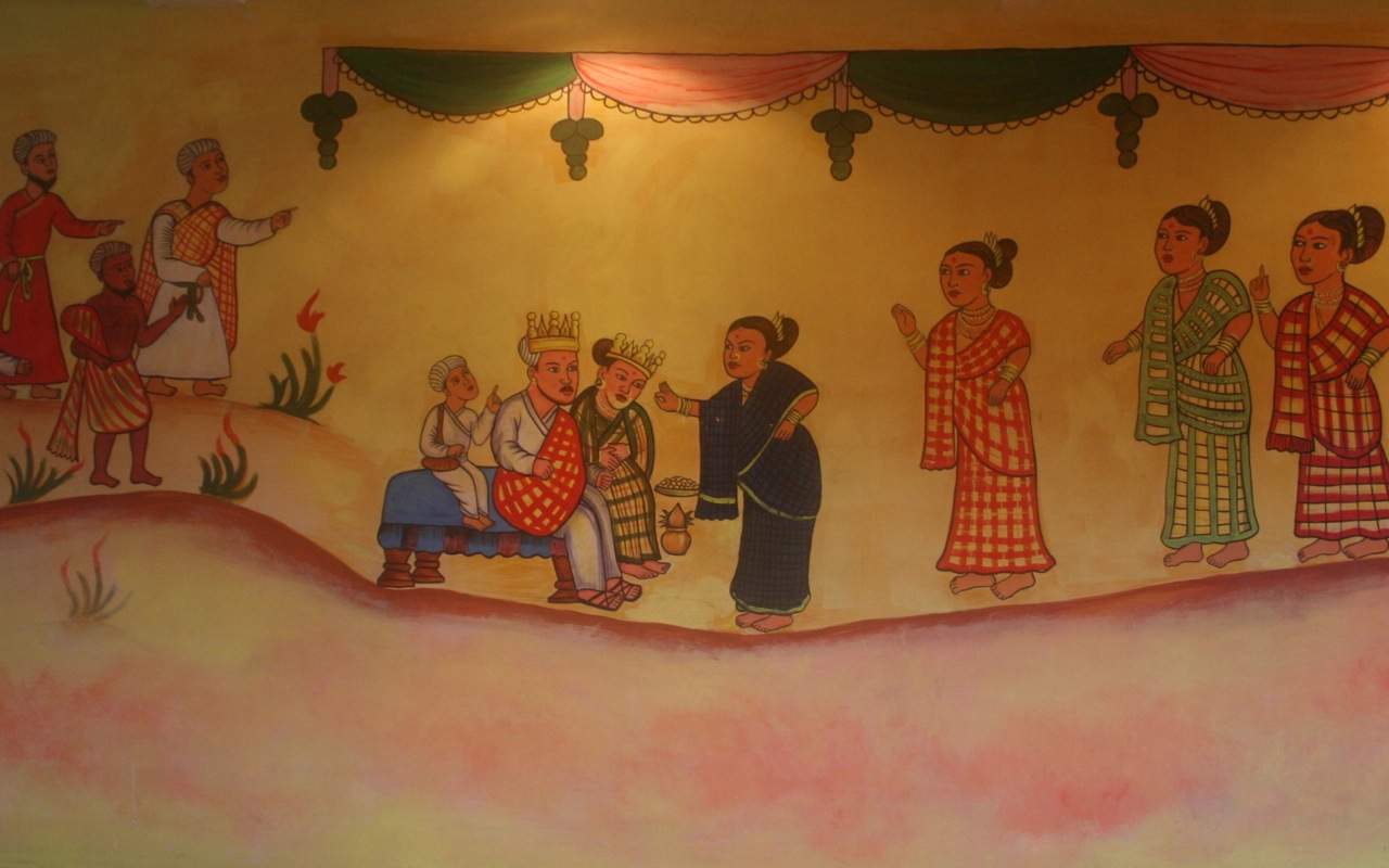 a large mural with some people in the background