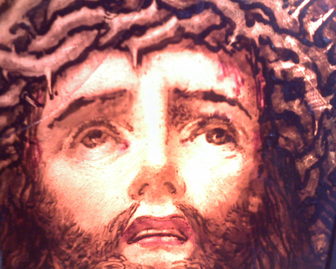 a painting of jesus is shown as a piece of art