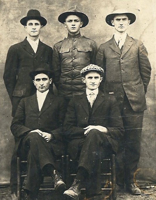 an old po of men in suits and hats