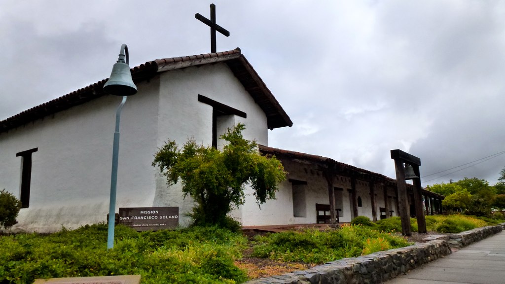 a large church with a cross on top of it