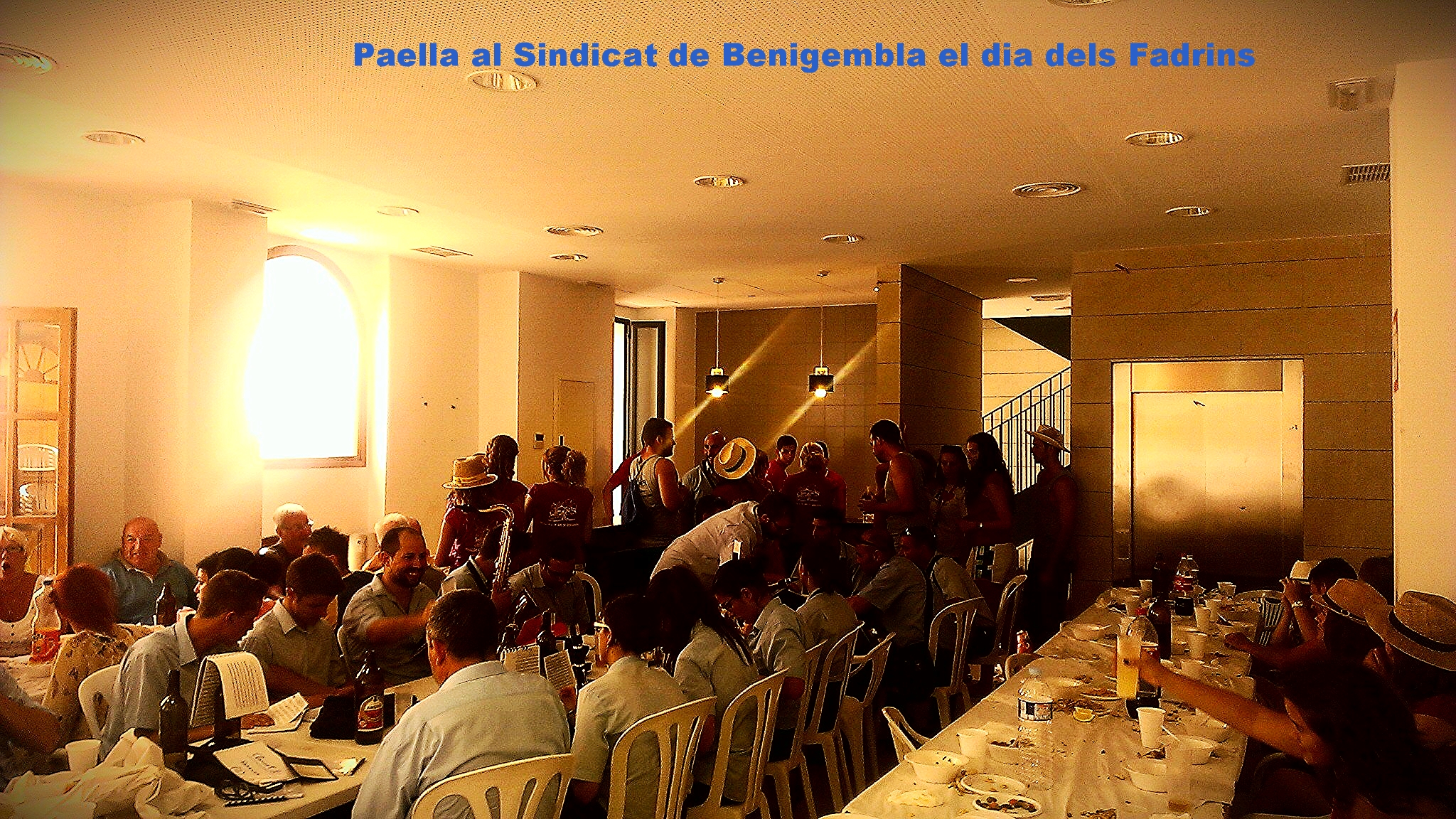 group of people at dinner in an old church