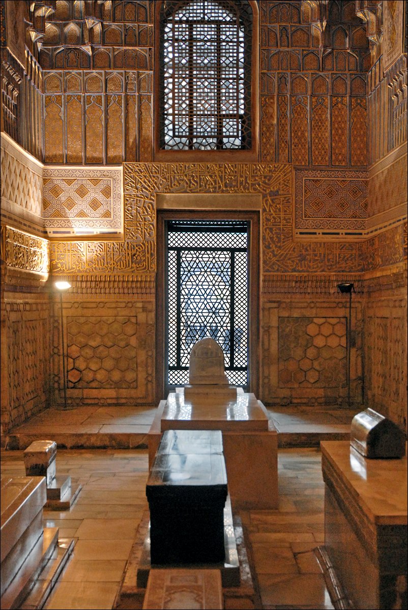 the door to a large area of a building is in arabic script