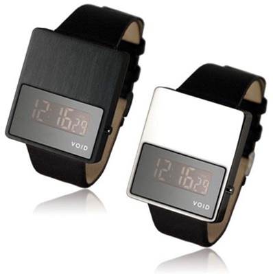 a couple of wrist watches that have digital numbers on the front