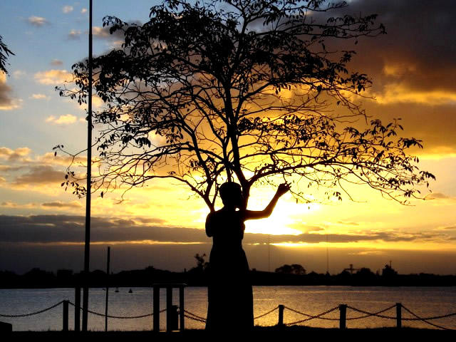 woman dancing in the shade of the setting sun
