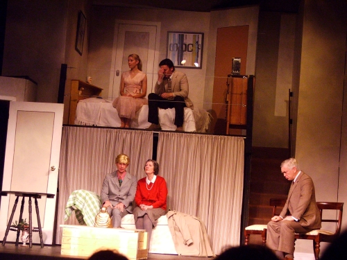 a group of people on a stage playing a role