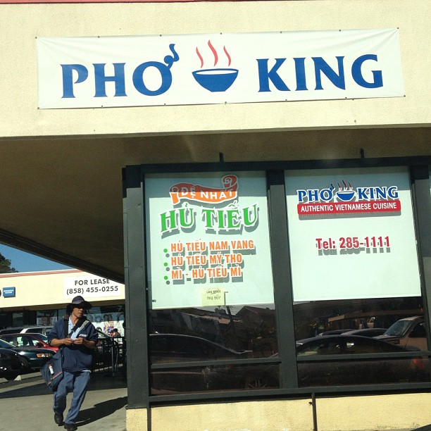 a sign on a building that reads pho king