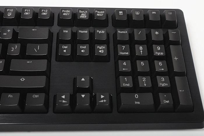 a black keyboard has a few arrows for different color choices