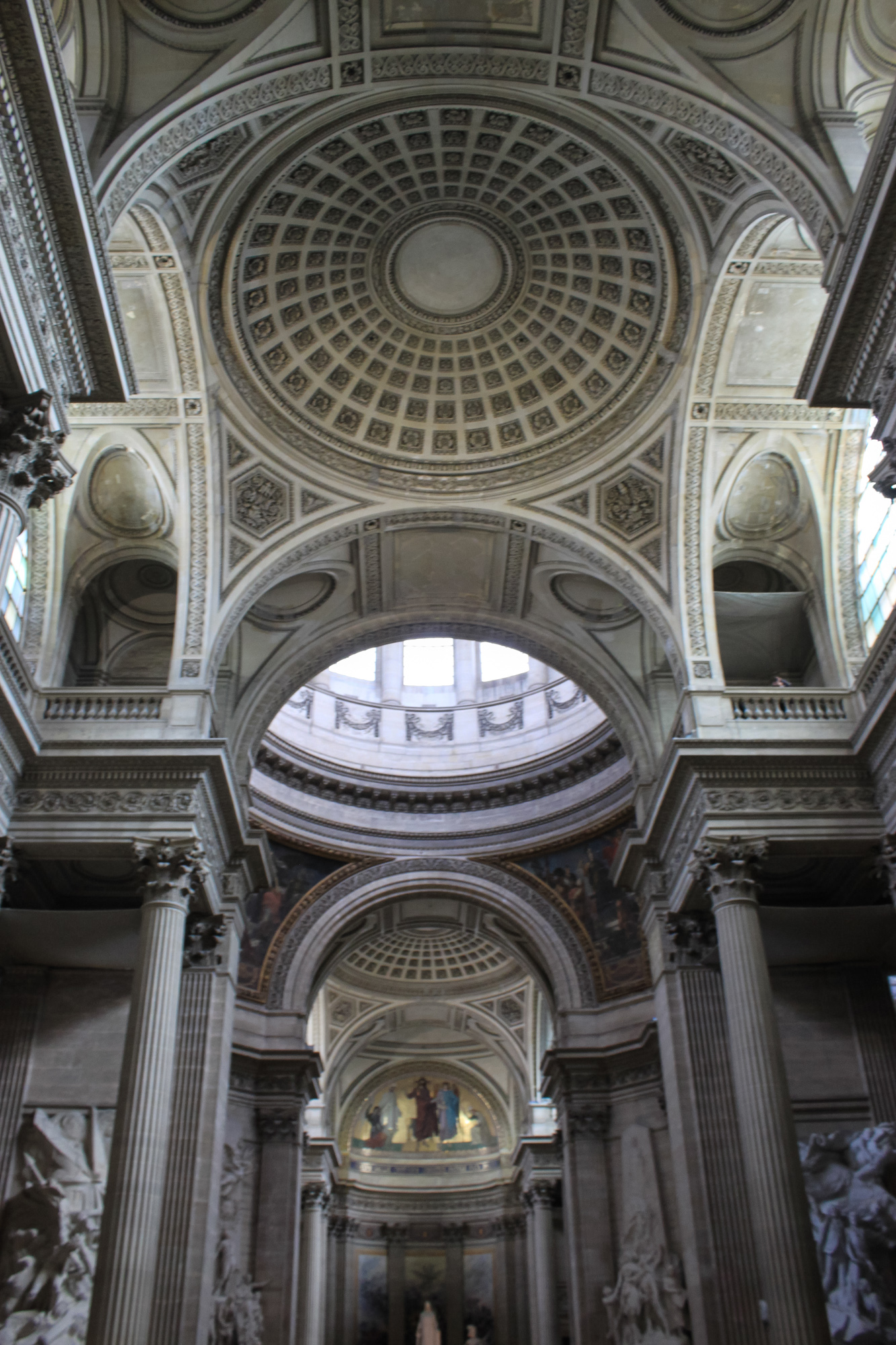 interior of a large, elaborate building with a skylight overhead