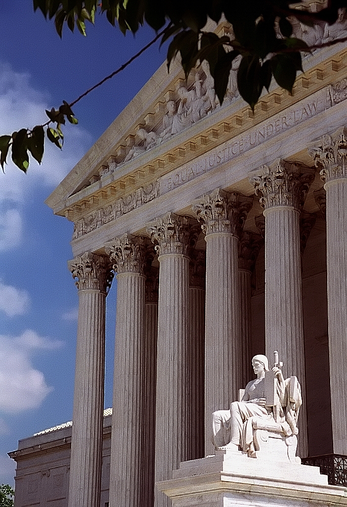 the supreme court building in washington dc is lined with pillars