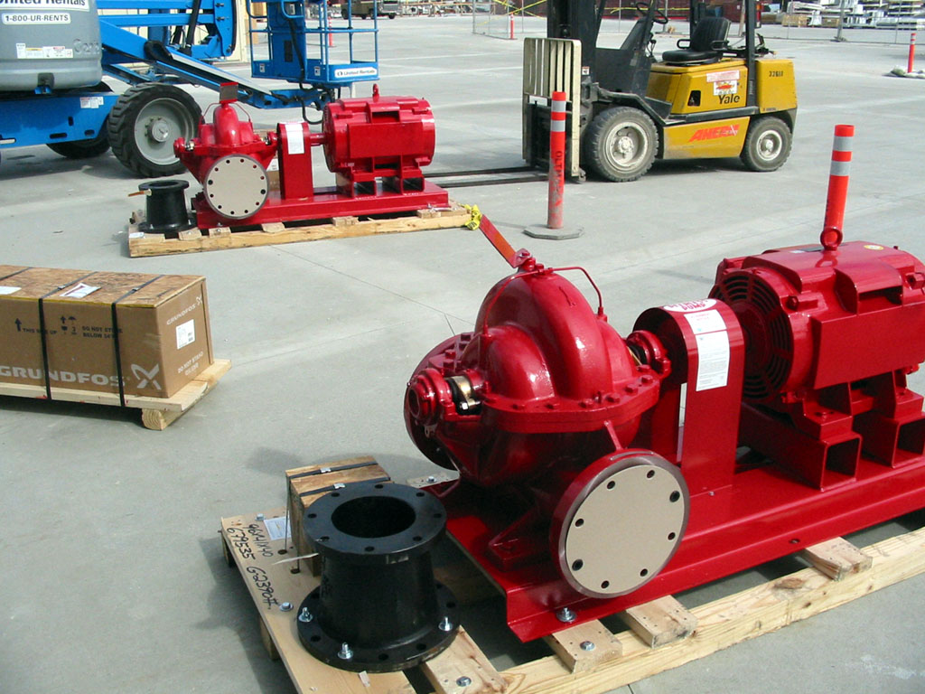 a red device in a parking lot