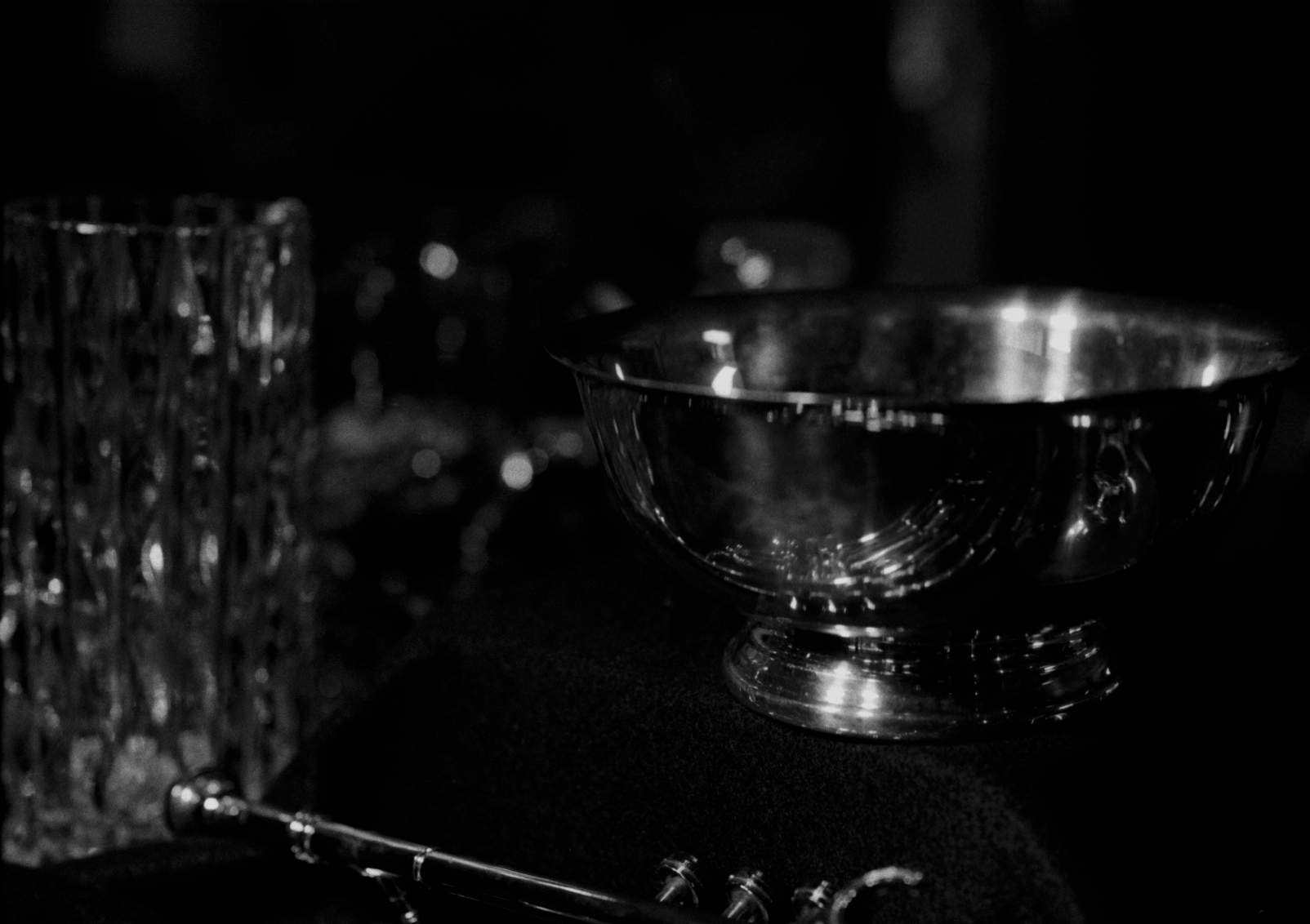 a bowl and a glass cup on a table