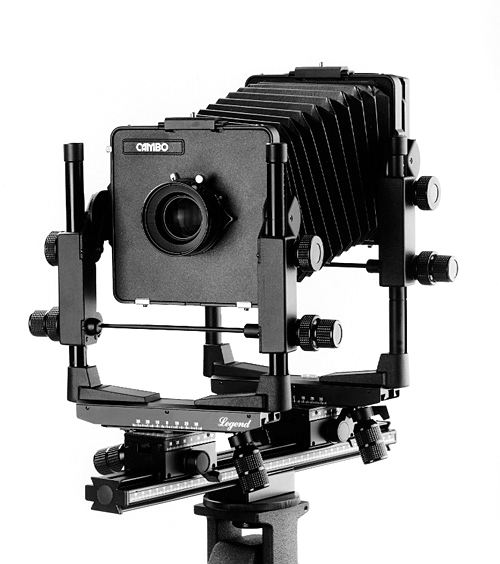 an old style camera attached to a tripod