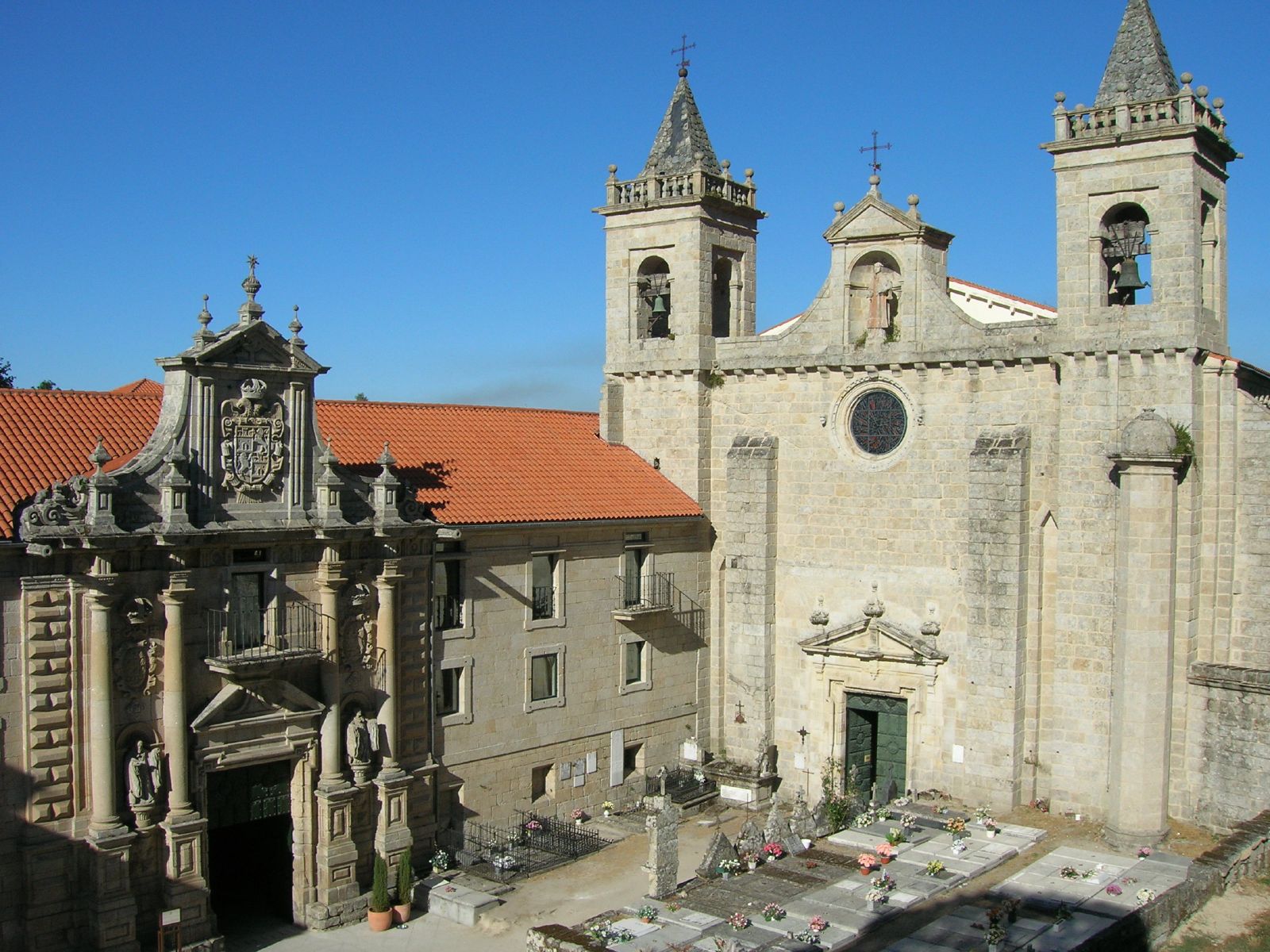 a large church surrounded by old buildings