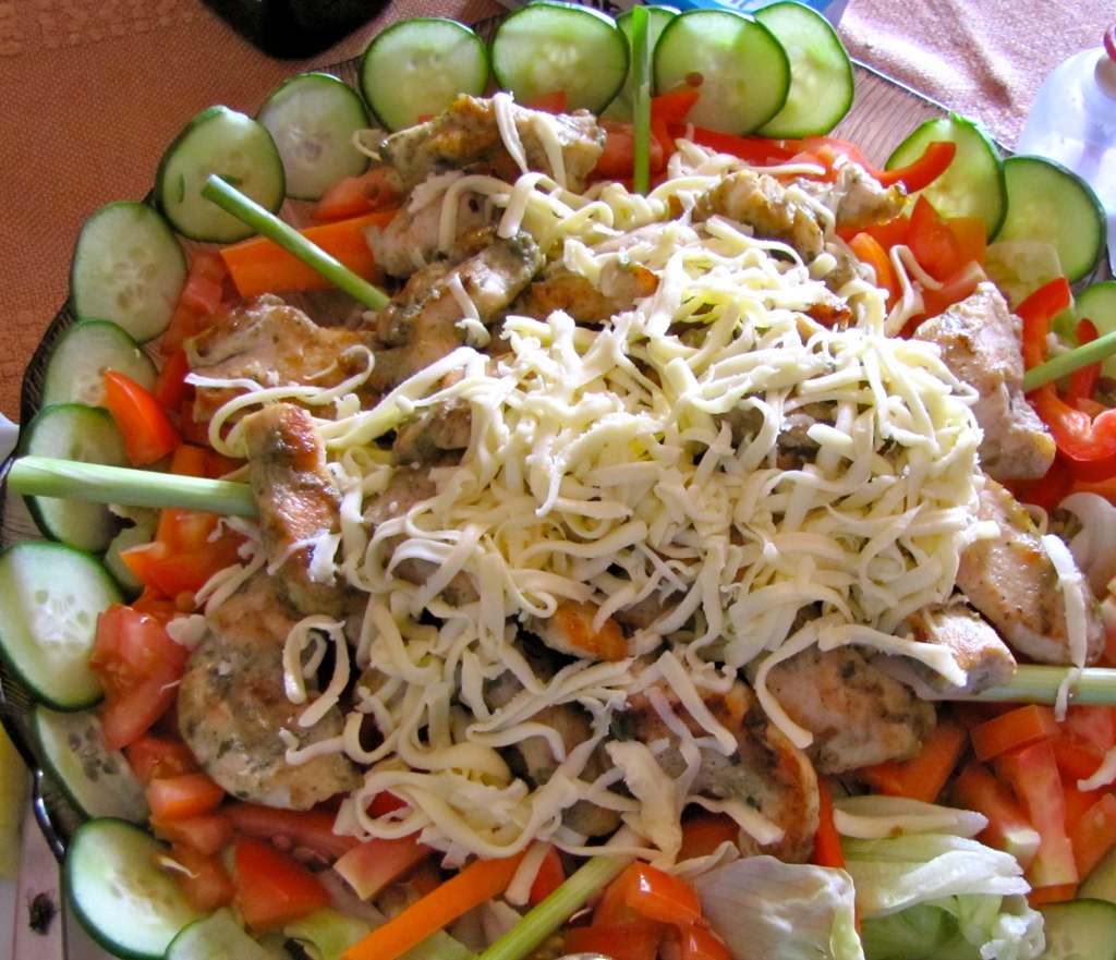 an elaborate vegetable dish on a glass bowl