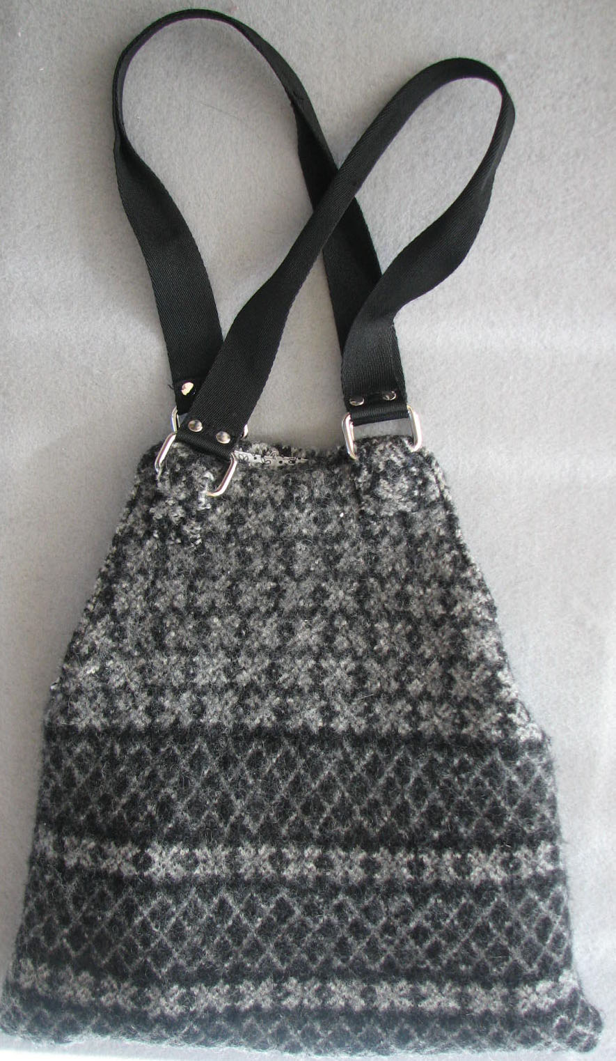 an image of a black and white purse
