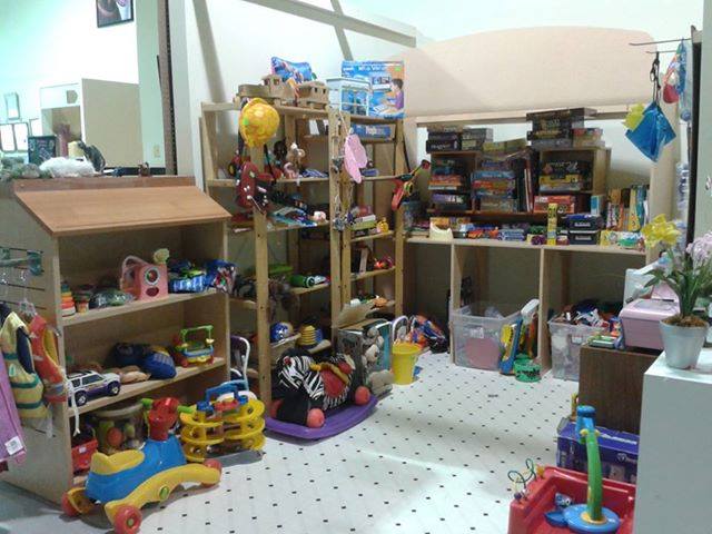 shelves with various toys and objects on them