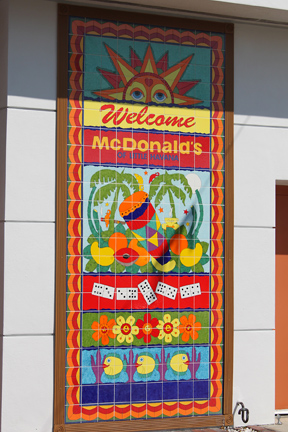 an outdoor painted sign on the side of a building