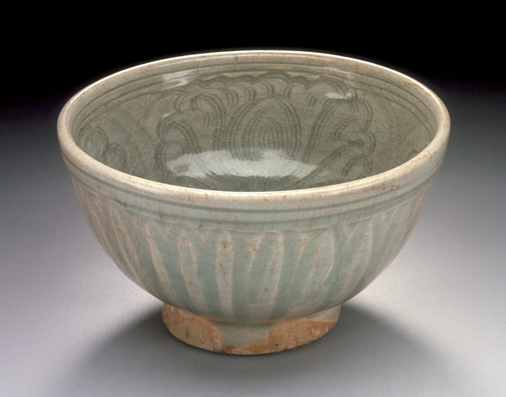 a light green colored bowl with a decorative pattern