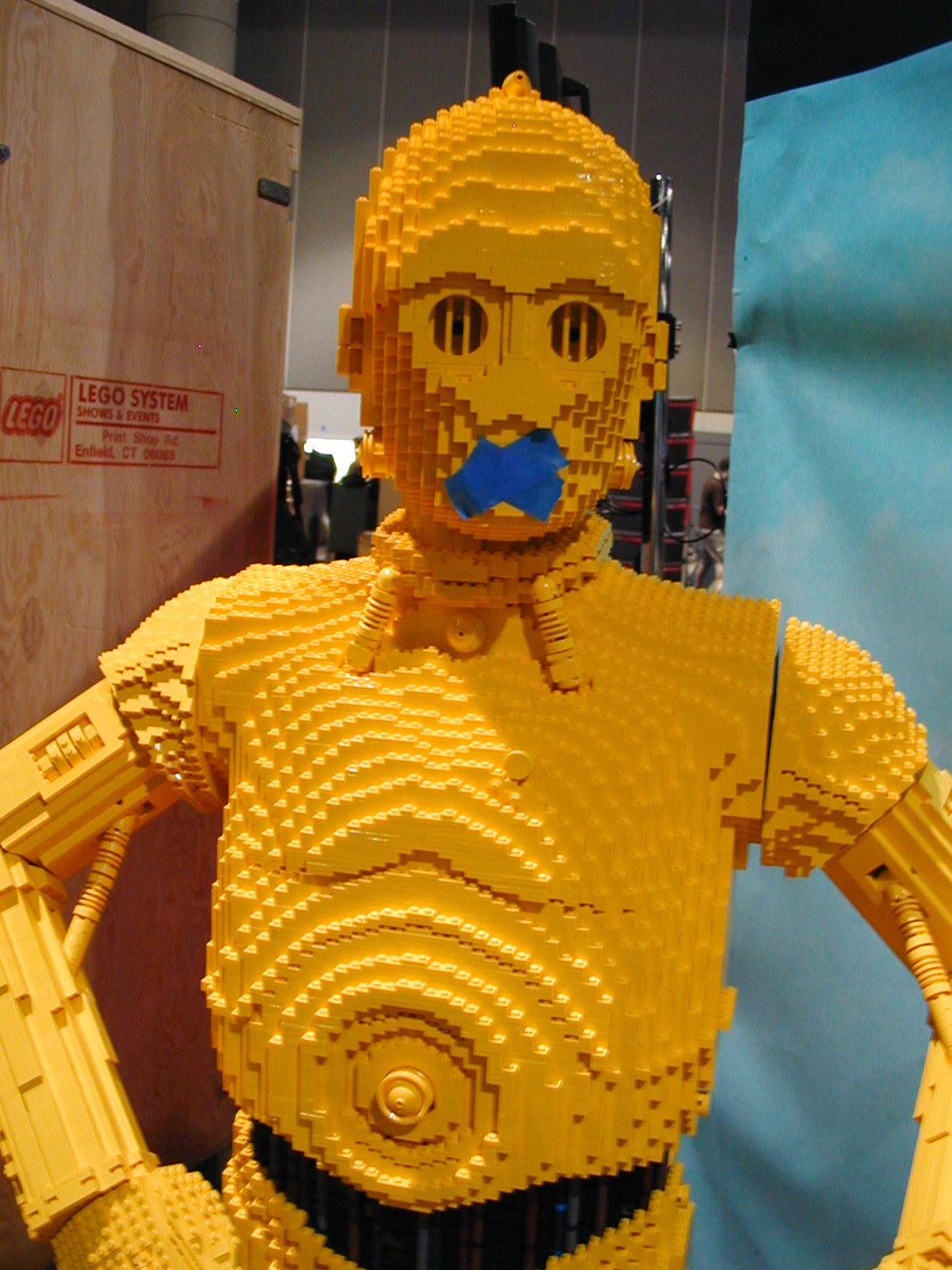 a lego star wars character wearing an oxygen tube