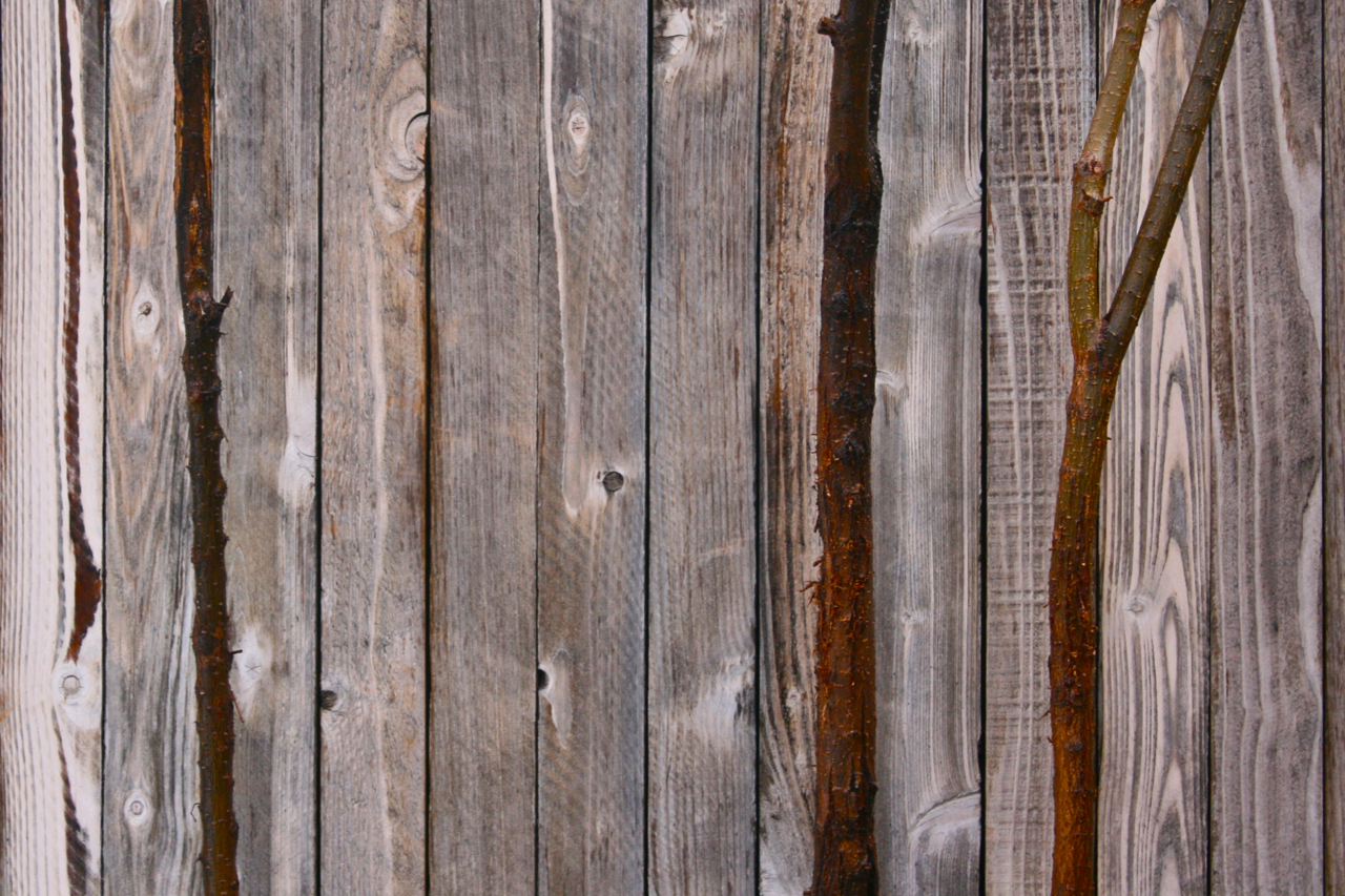 a closeup image of wood with a fence