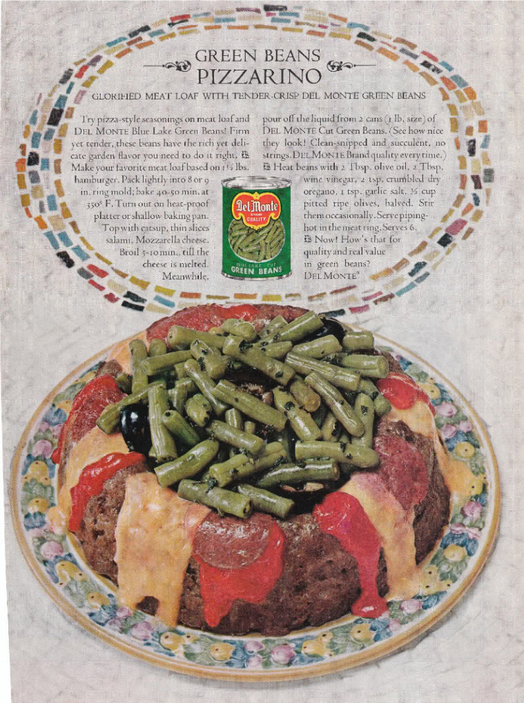 a plate of food containing beans and green beans