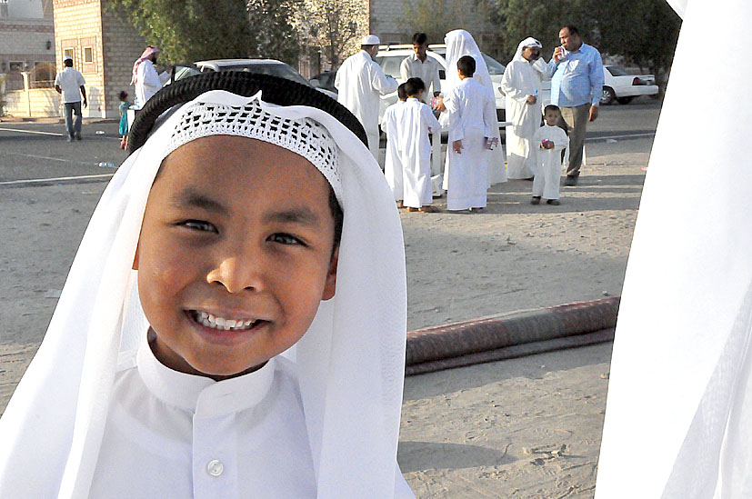 a child dressed in a religious costume posing for a po