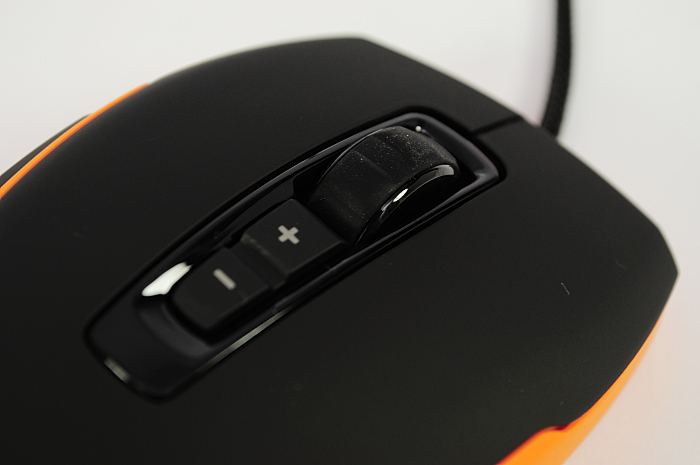 the mouse is black with orange trim and ons