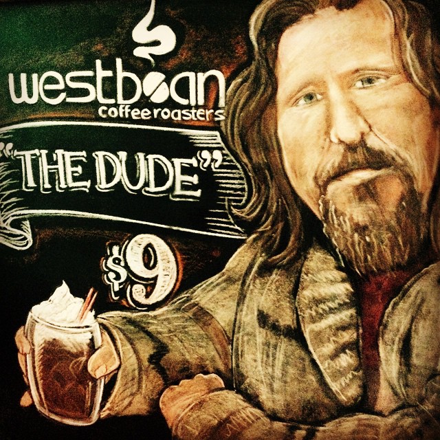 painting of the dude next to an advertit for a beer