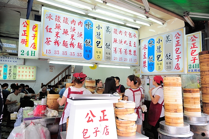 people are ordering food in oriental city marketplace