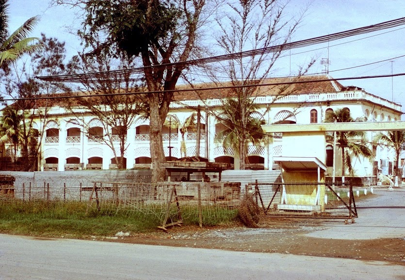 the old house is made up of white and yellow